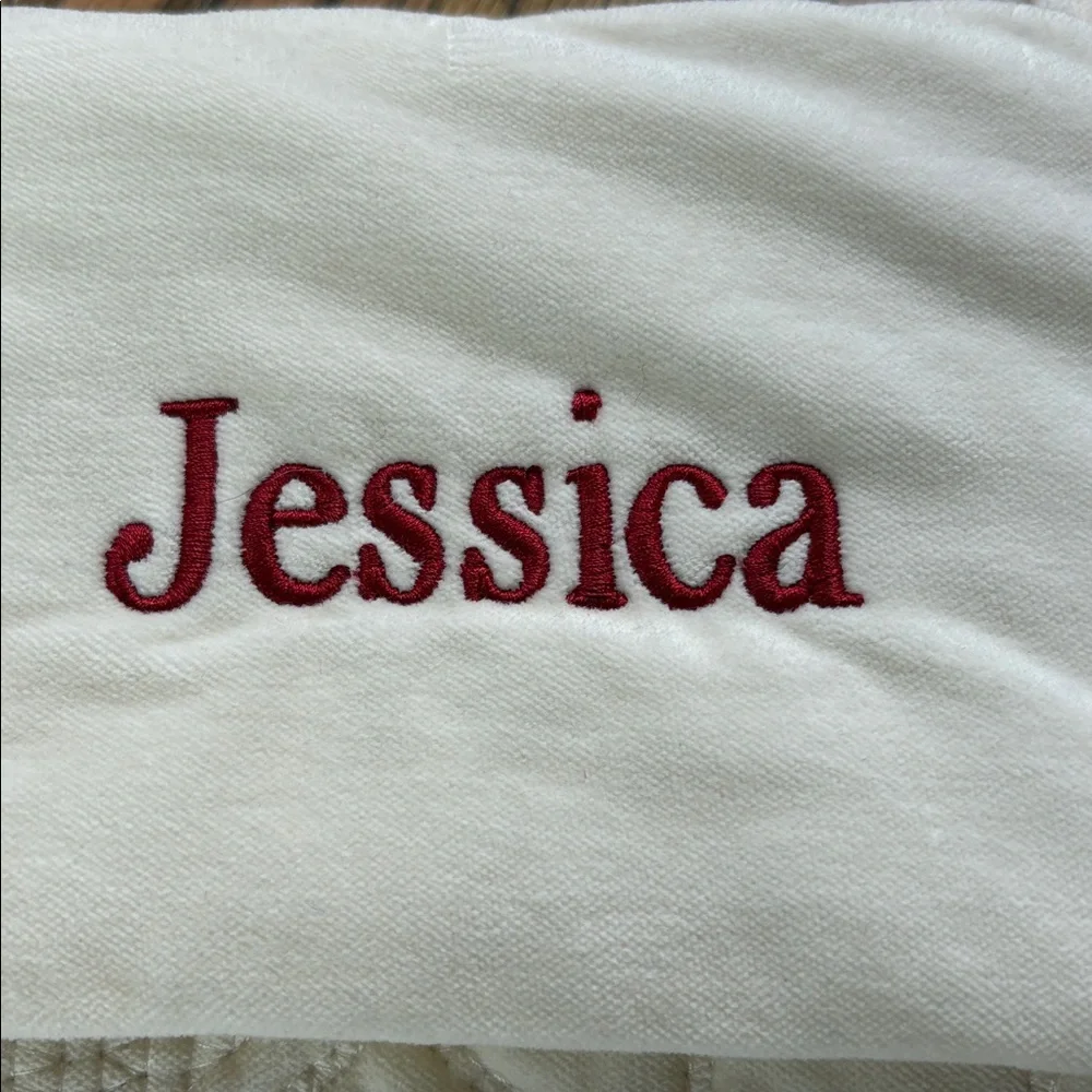 Pottery Barn cream colored quilted stocking with Jessica embroidered
